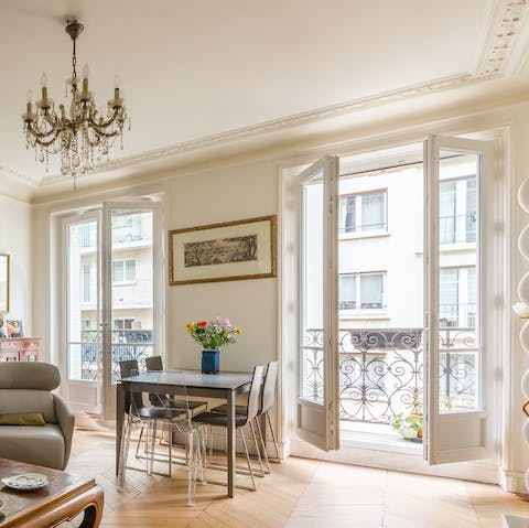 Open up the balconies overlooking some of the most chic streets of Paris