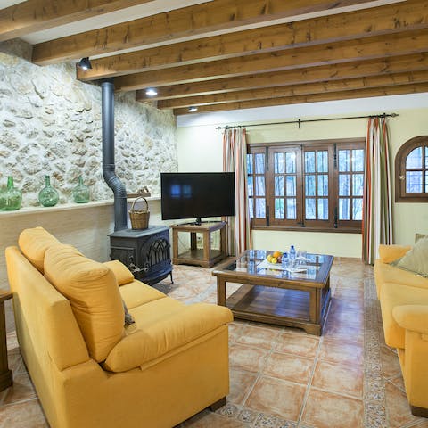 Spend chillier evenings cosied up in the rustic living space