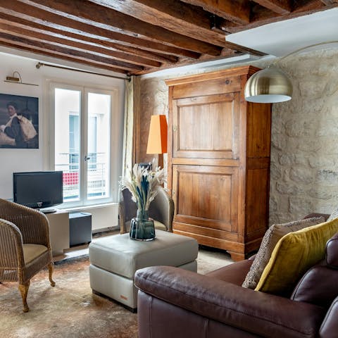 Kick back with a glass of French wine in the traditional living area