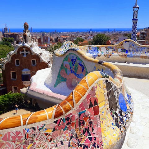 Visit nearby Parc Güell with its colourful mosaics