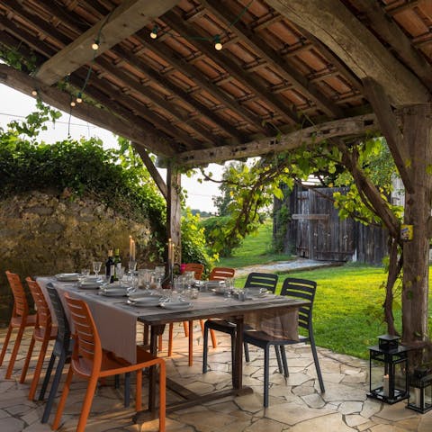 Enjoy a toast with sauvignon blanc in the rustic charm of the garden
