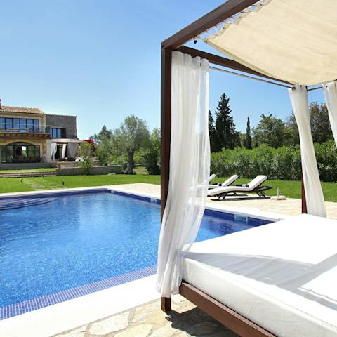 Catch those warm rays while lounging by the pool or take a refreshing dip in its glistening water