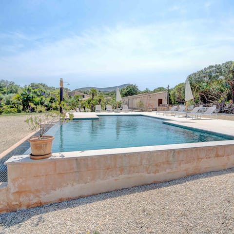 Cool off from the Mallorcan heat in the home's large private pool