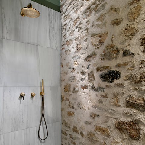 Freshen up after a day exploring Athens in the bronze and marble shower