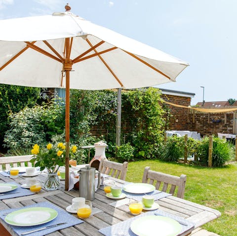 Enjoy alfresco meals in the quaint garden during summer months