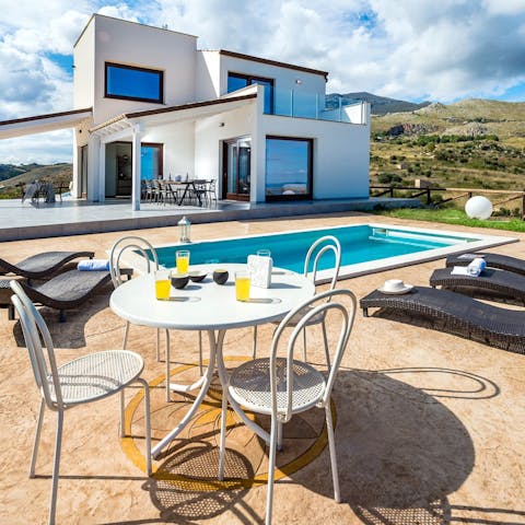 Enjoy breakfast with Sicilian countryside views