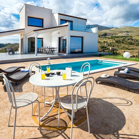 Enjoy breakfast with Sicilian countryside views