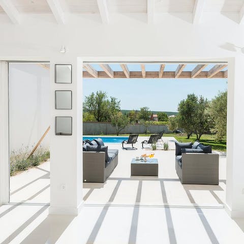 Enjoy a sense of indoor-outdoor living as you drift easily from your living area to your sun-drenched patio