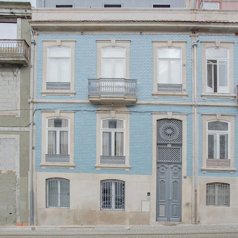 Stay in a traditional powder blue house in downtown Porto