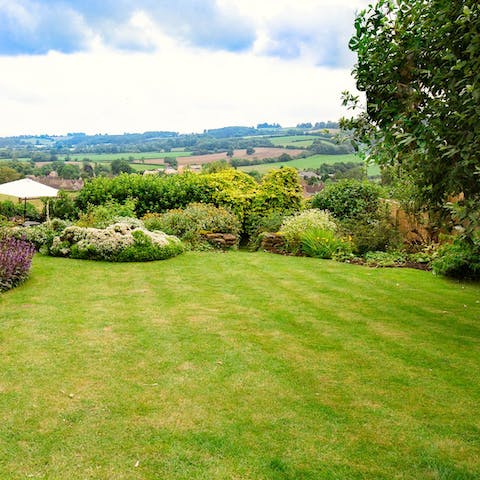 Spend time in the private garden with rolling landscape views