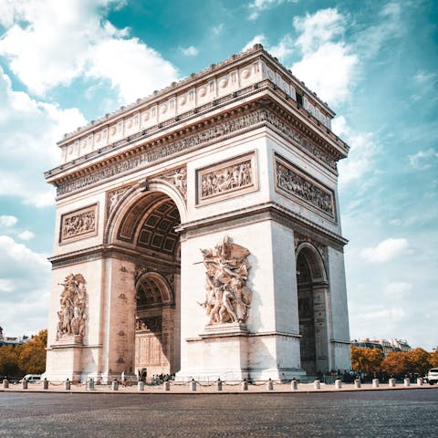 Marvel at the Arc de Triomphe, twenty minutes by metro