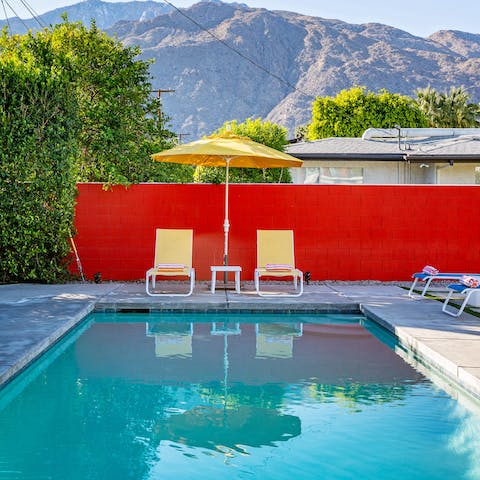 Take a refreshing swim in the pool, surrounded by those stunning mountain views