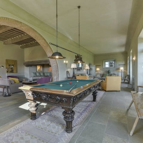 Gather together for games of pool on the full-size tables
