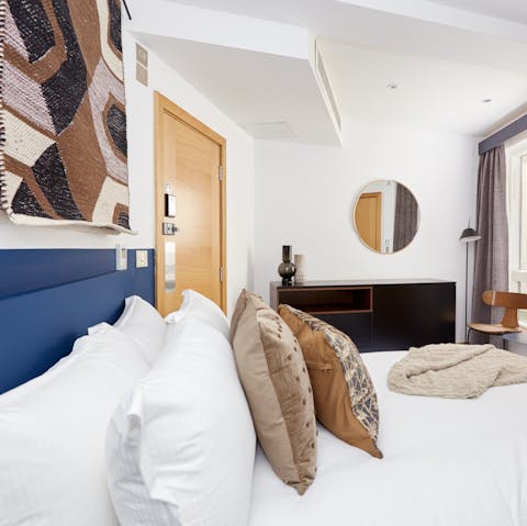 Kick back on the plump bed after a day of exploring, shopping and fine dining in London