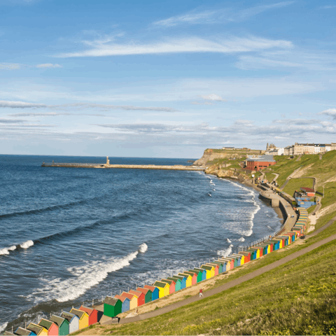 Sink your toes in the sand at Whitby Beach, a five-minute walk away
