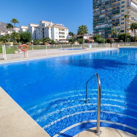 Enjoy a refreshing swim in the outdoor communal swimming pool