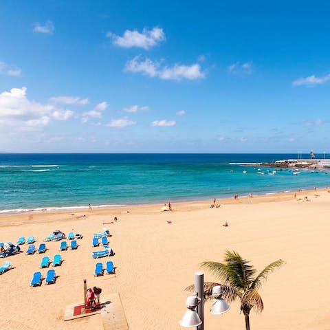 Stay right on Las Canteras Beach, just a few steps from the soft sand and crystal-clear waters