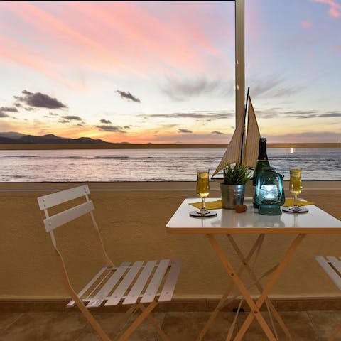 Enjoy a romantic dinner by the ocean as you watch the unforgettable sunset