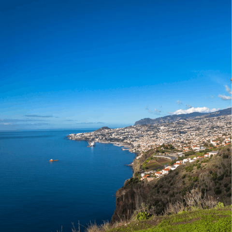 Stay in Funchal, just 1km from the pebble and black sands of Formosa Beach