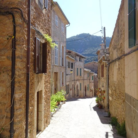 Drive eight minutes to Pollença and explore the charming narrow lanes