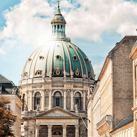 Amble 500m up the road to the royal residence of Amalienborg Palace and Frederik's Church