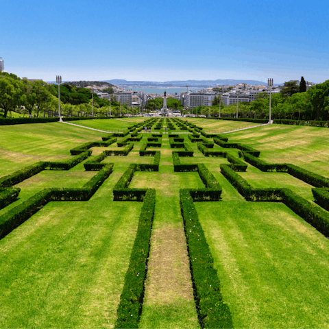 Take an afternoon stroll through Parque Eduardo VII, a fifteen-minute walk away