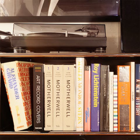 Make use of the record player and shelves of books 