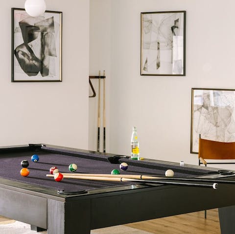 Play a game of pool to wind down in the evening