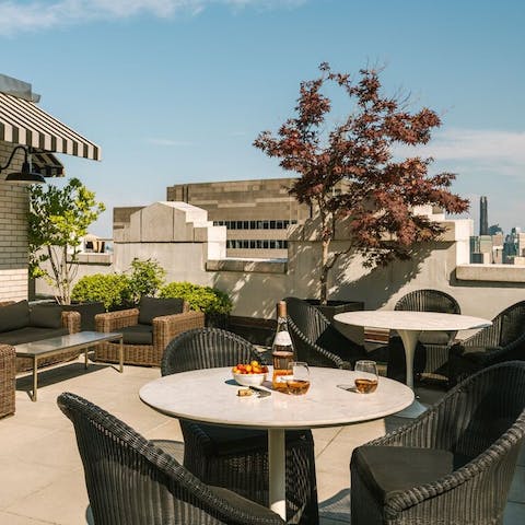 Enjoy sunset drinks at the rooftop lounge