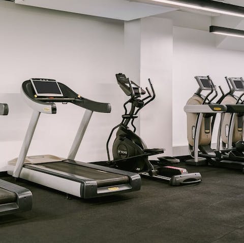 Keep up with your fitness routine in the building’s gym