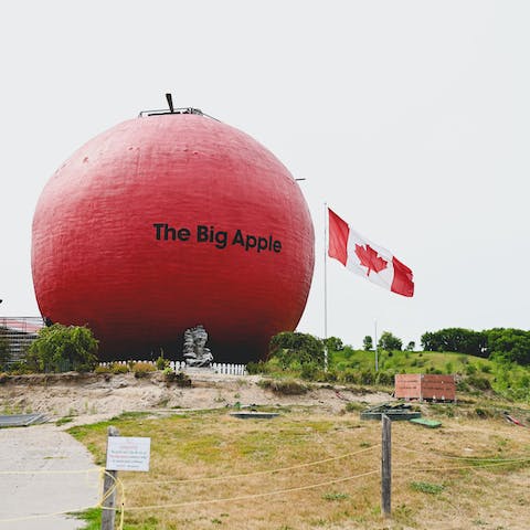 Take a picture with the iconic Big Apple, only five-minutes away on foot