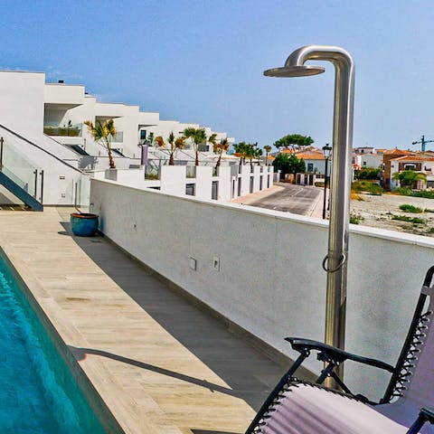 Wash off after a trip to the beach with the outdoor shower