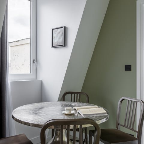 Sit down to breakfast in the bright dining area