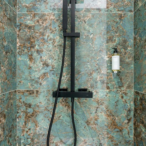 Feel refreshed after a shower in the stunning marble shower