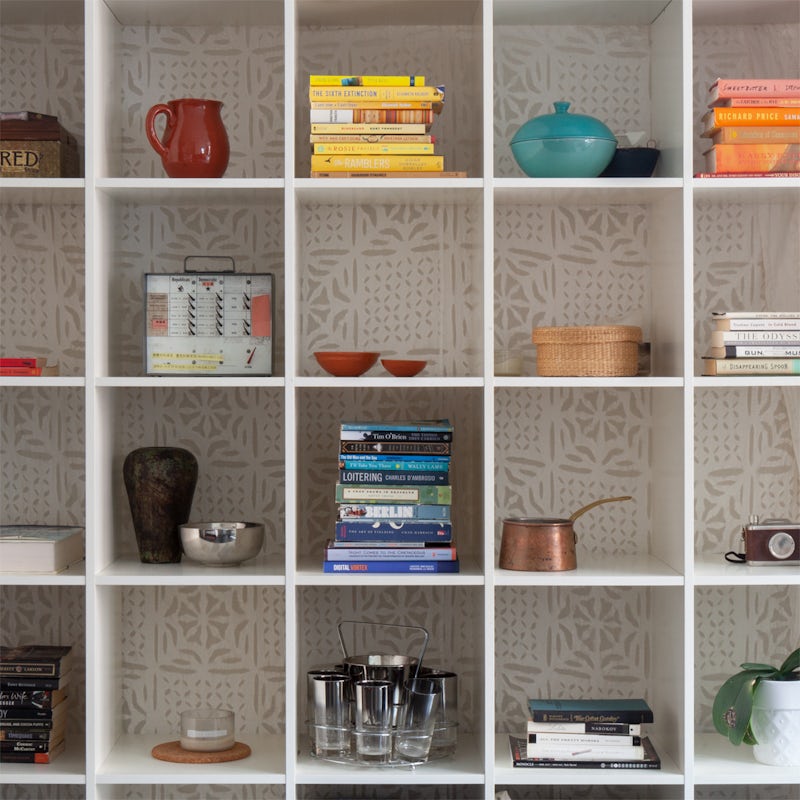 Grab a book a book from decorative shelves for a moment of relaxation, after a busy day of discovering NYC
