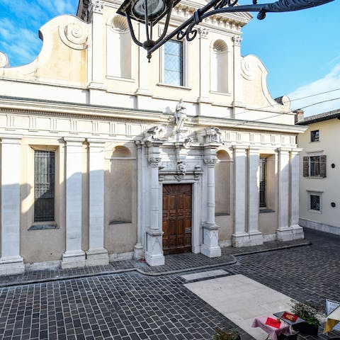 Take in the beautiful view of the city's cathedral from the bedroom 