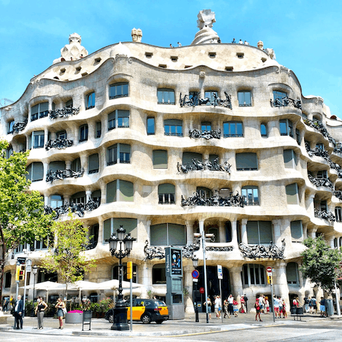 Stroll to Casa Milà in five minutes and head up to its iconic rooftop