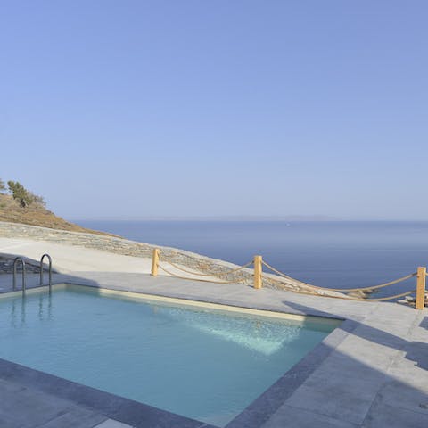 Take in the magnificent ocean views from your position in the private swimming pool