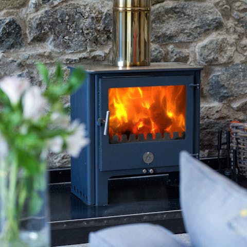 Warm up by the wood-burning fireplace with a glass of wine