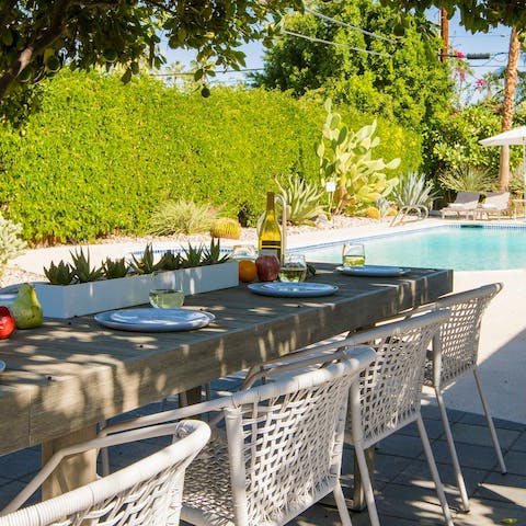 Indulge in a daytime feast under the shaded dining area
