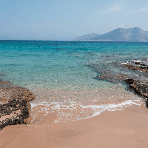 Visit the stunning beach of Agios Prokopios and find golden sand and crystal-clear waters