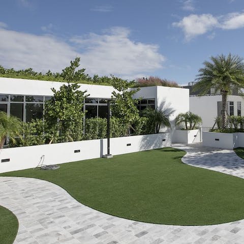 Cool off from the Miami heat under the shared courtyard's outdoor shower