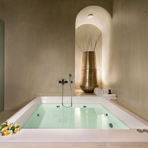 End the day with a soak in the private Jacuzzi tub