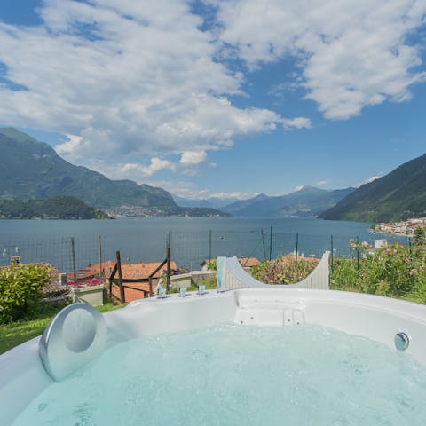 Unwind in the Jacuzzi as you admire Lake Como views