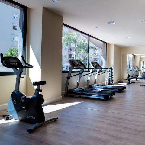 Work out in the communal fitness centre before heading out for the day