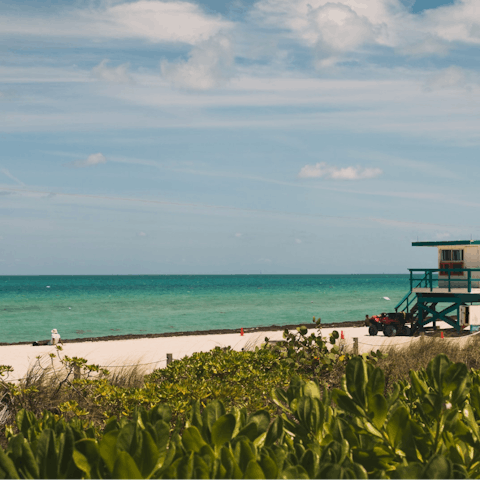 Sunbathe on iconic sandy beaches