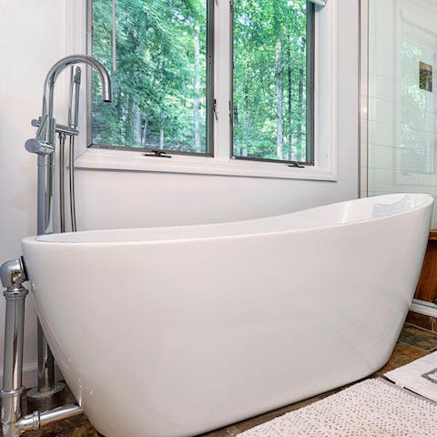 Sink into the deep free-standing tub for a relaxing soak
