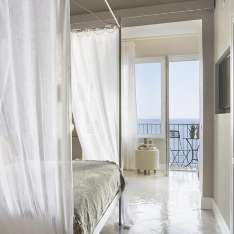 Enjoy a duvet day in the canopy bed as you listen to the ocean waves