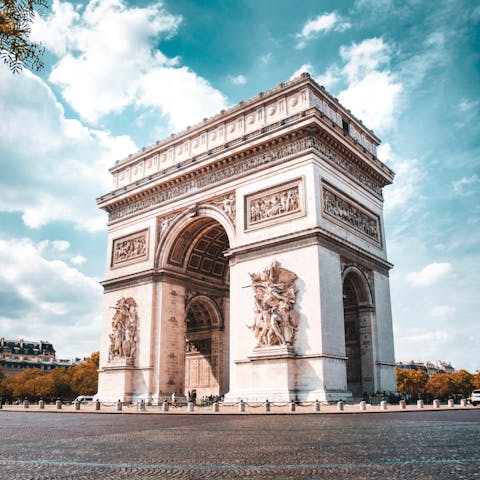 Gaze up at the Arc de Triomphe, a fifteen-minute walk away