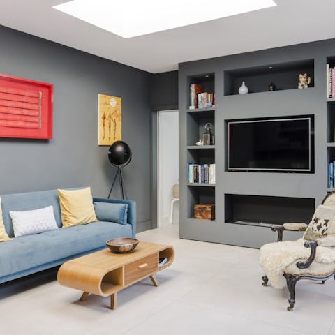 Relax in the stylish living area that's used as a photographic studio